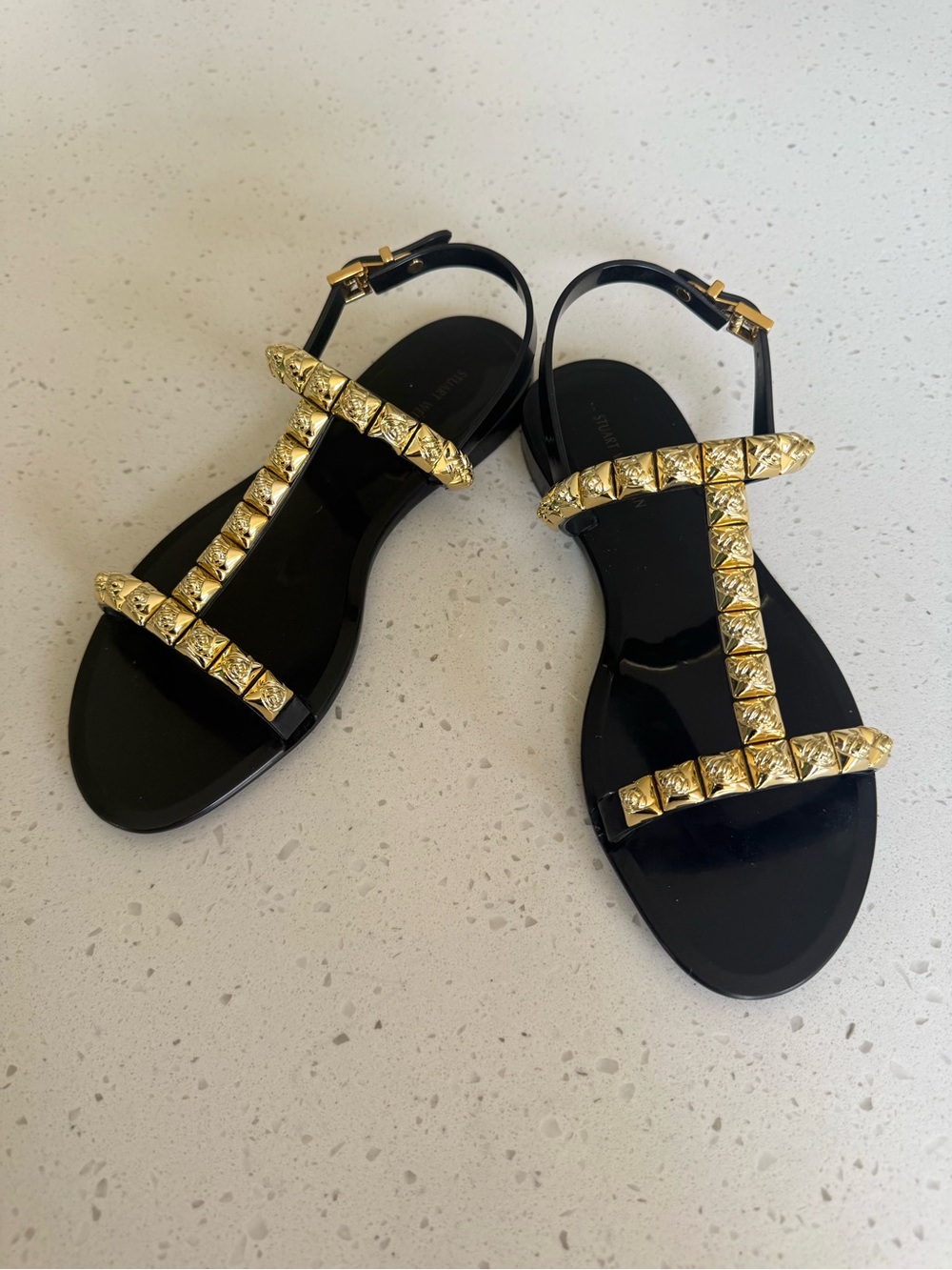Stuart Weitzman Black T-Strap Sandals with Gold Studs